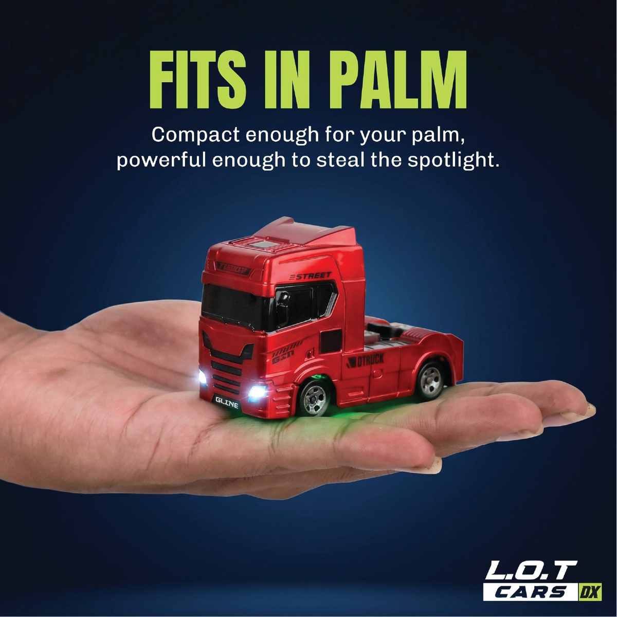 The red Mac truck cab resting on an open palm, showing how small a 1:64 tabletop drifter is