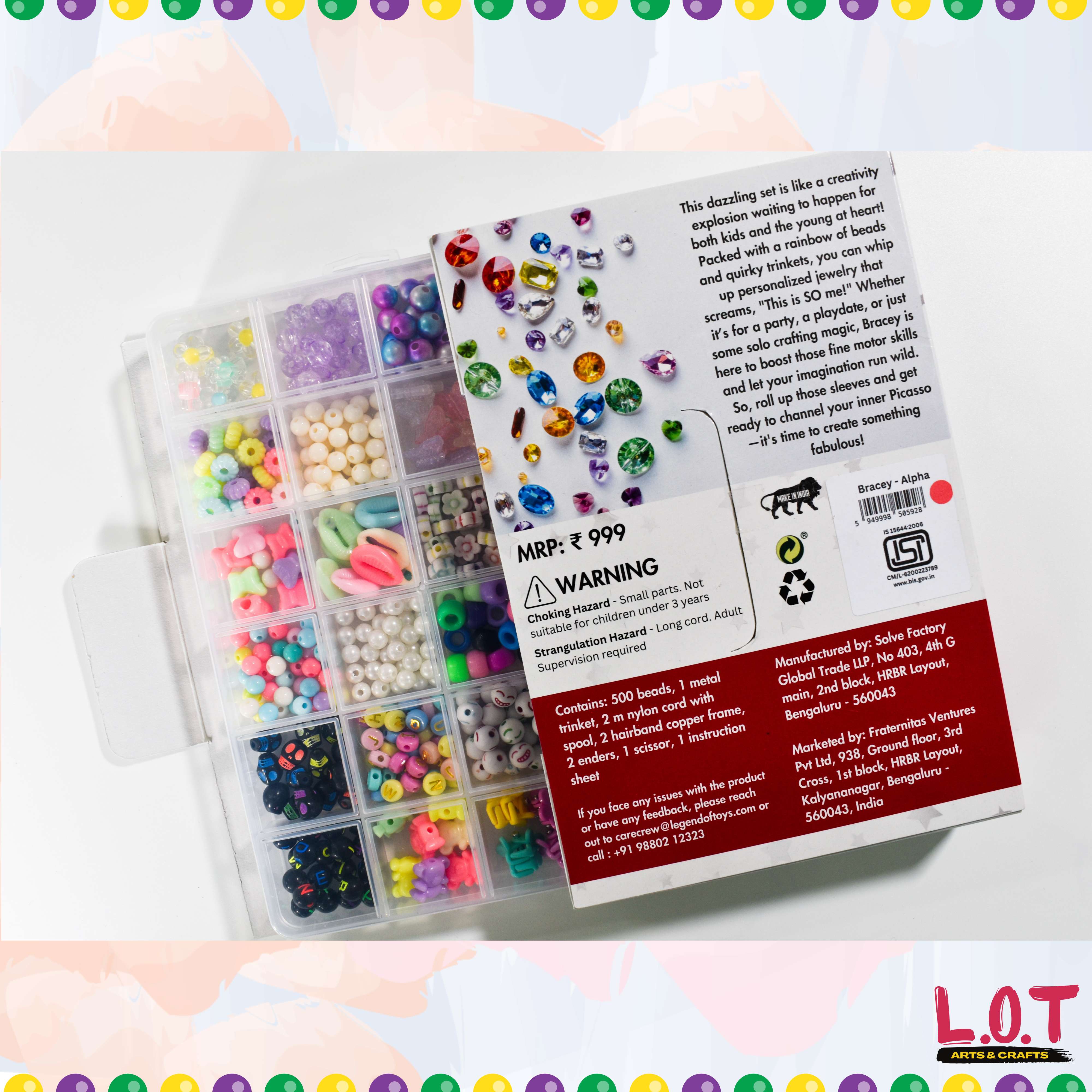 Colorful bead set in a clear organizer with packaging on a light pink background