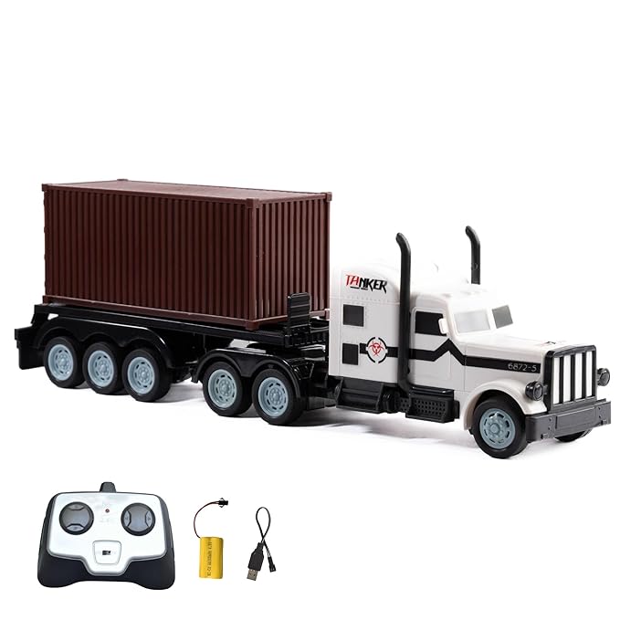 Toy RC truck with trailer and remote control on a white background