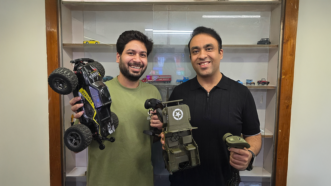 Two founder's of L.O.T holding the products from the company