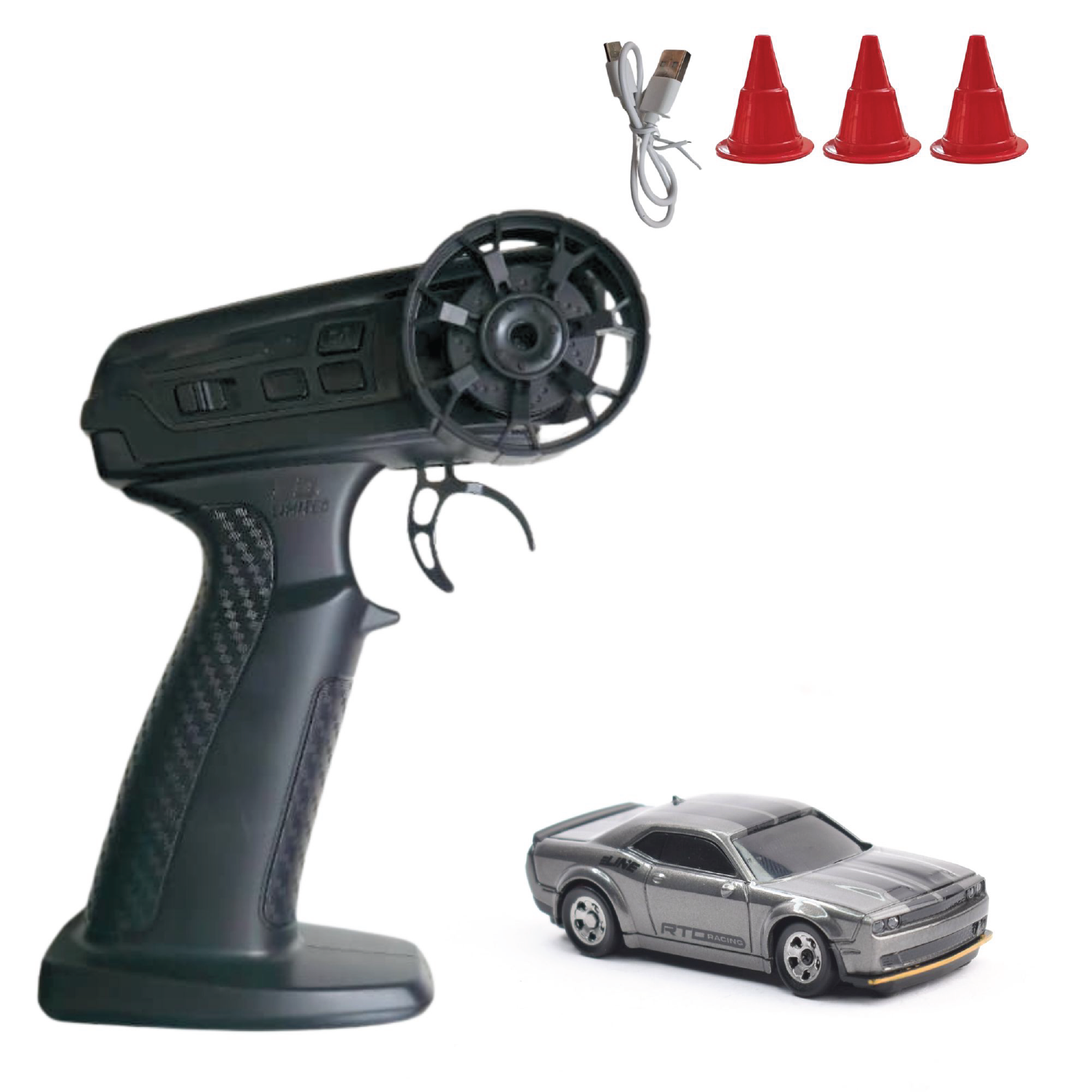 Black remote control transmitter with a silver toy car and three red cones on a white background
