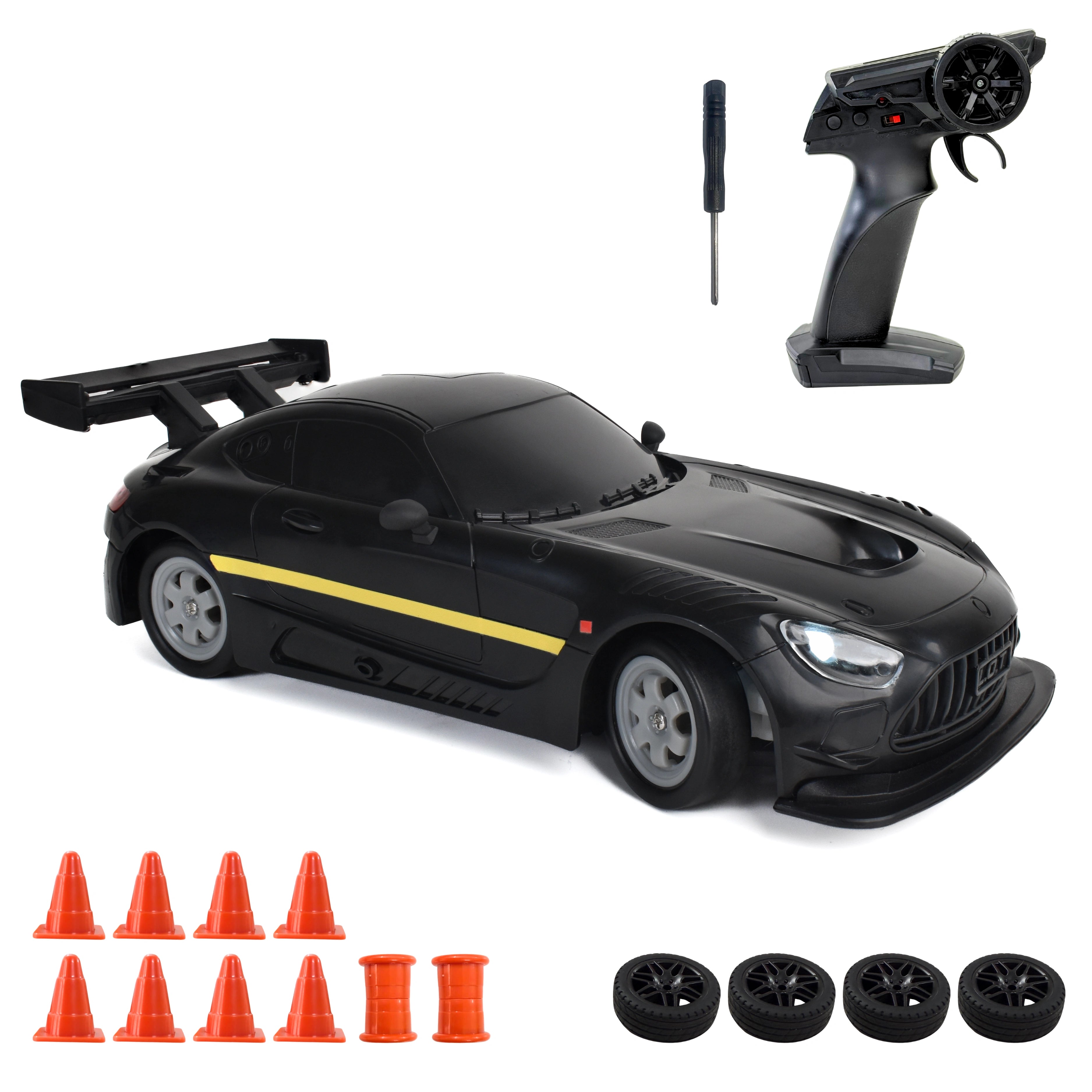 Black remote control car with yellow stripe, remote control, and traffic cones on a white background