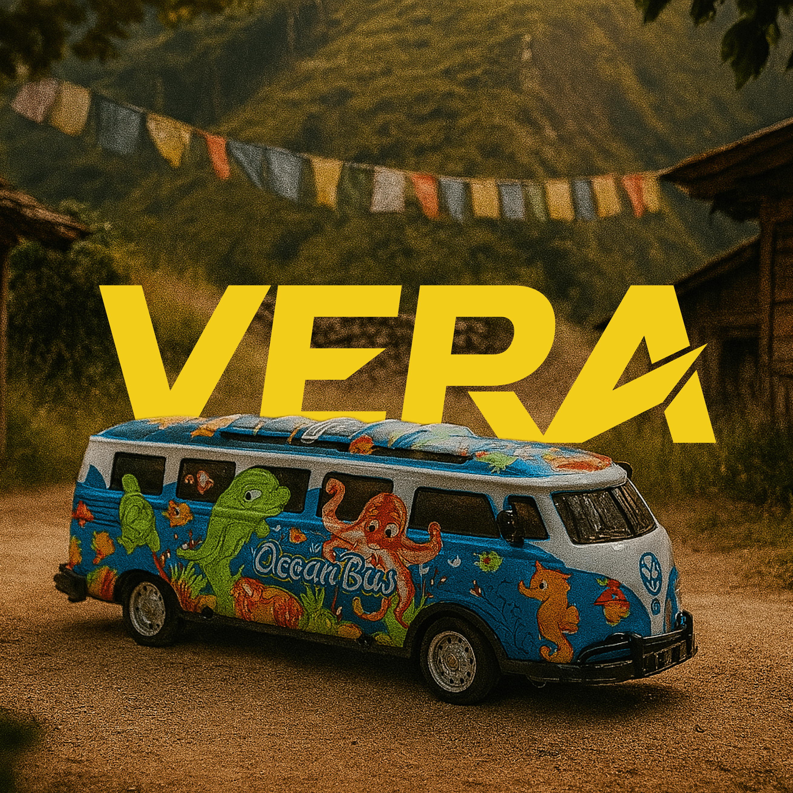 Colorful RC van with 'Ocean Bus' design and 'VERA' text in a scenic outdoor setting.