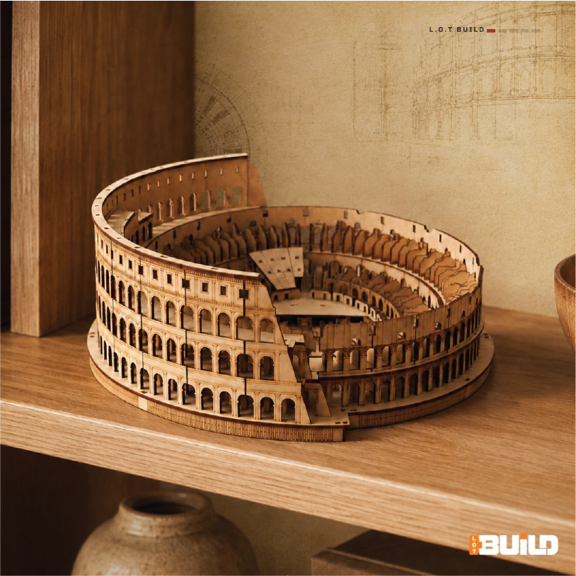 Assembled wooden Colosseum model on a shelf beside a terracotta pot