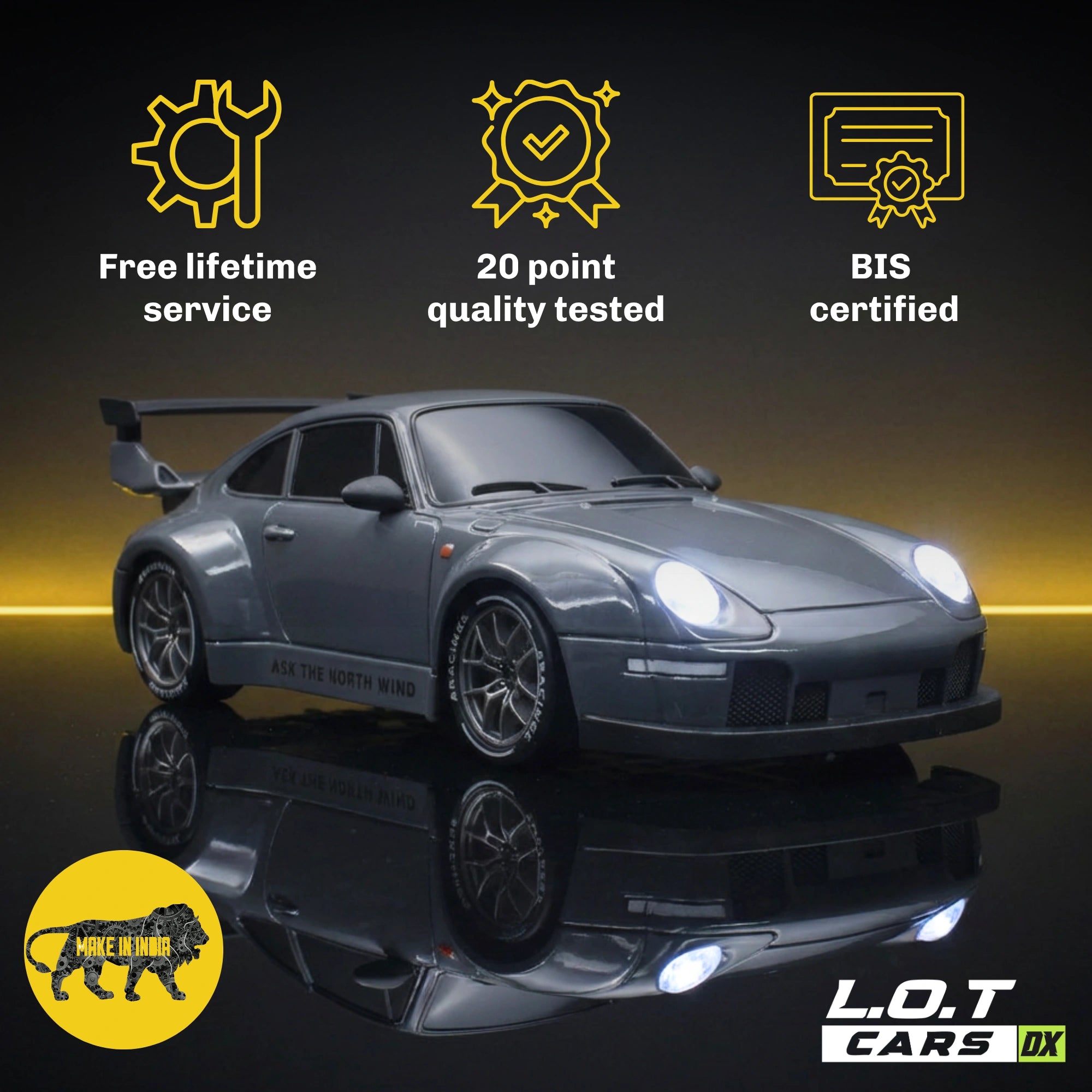 Gray RC car with certification icons and text on a reflective surface