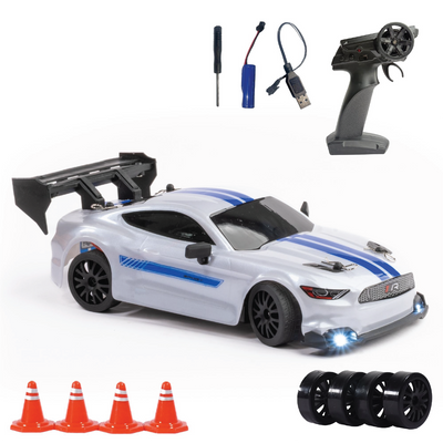 White RC car with blue stripes and remote control accessories on a white background