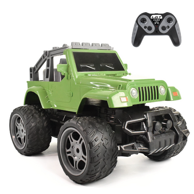Green RC off-road vehicle with large wheels and a remote control on a white background