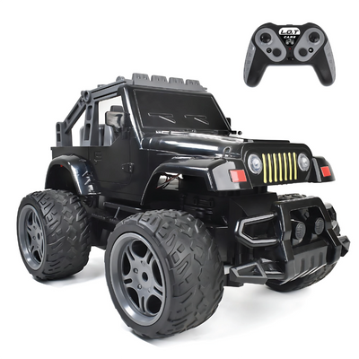 Black RC truck with large wheels and a controller on a white background