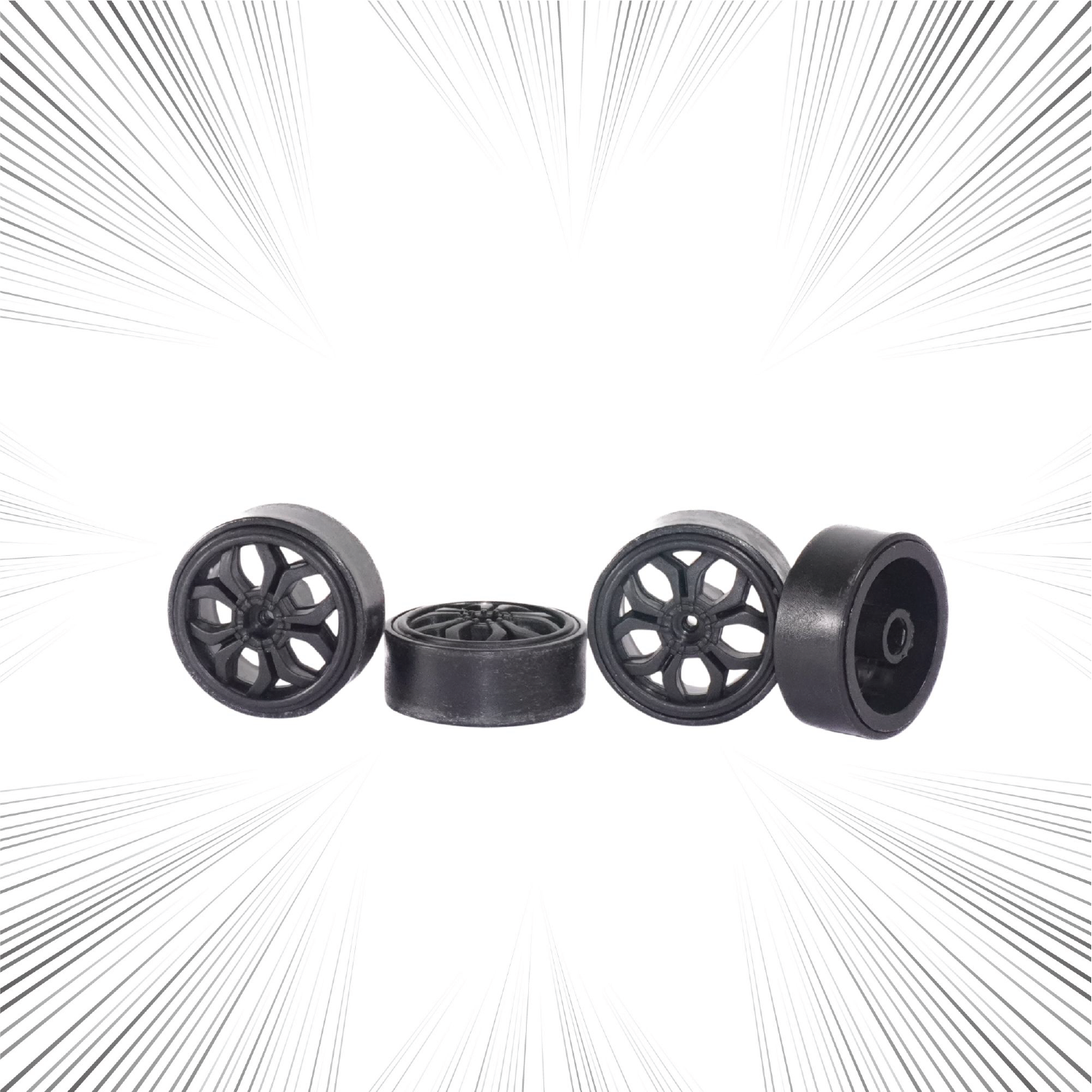 Four black RC Drift tyres on a white background 
