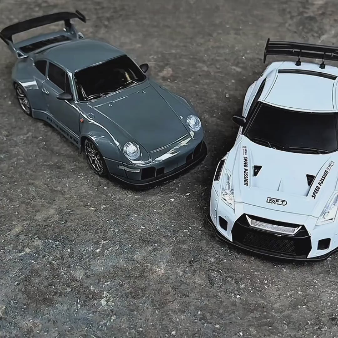 Two RC cars drifting around each other