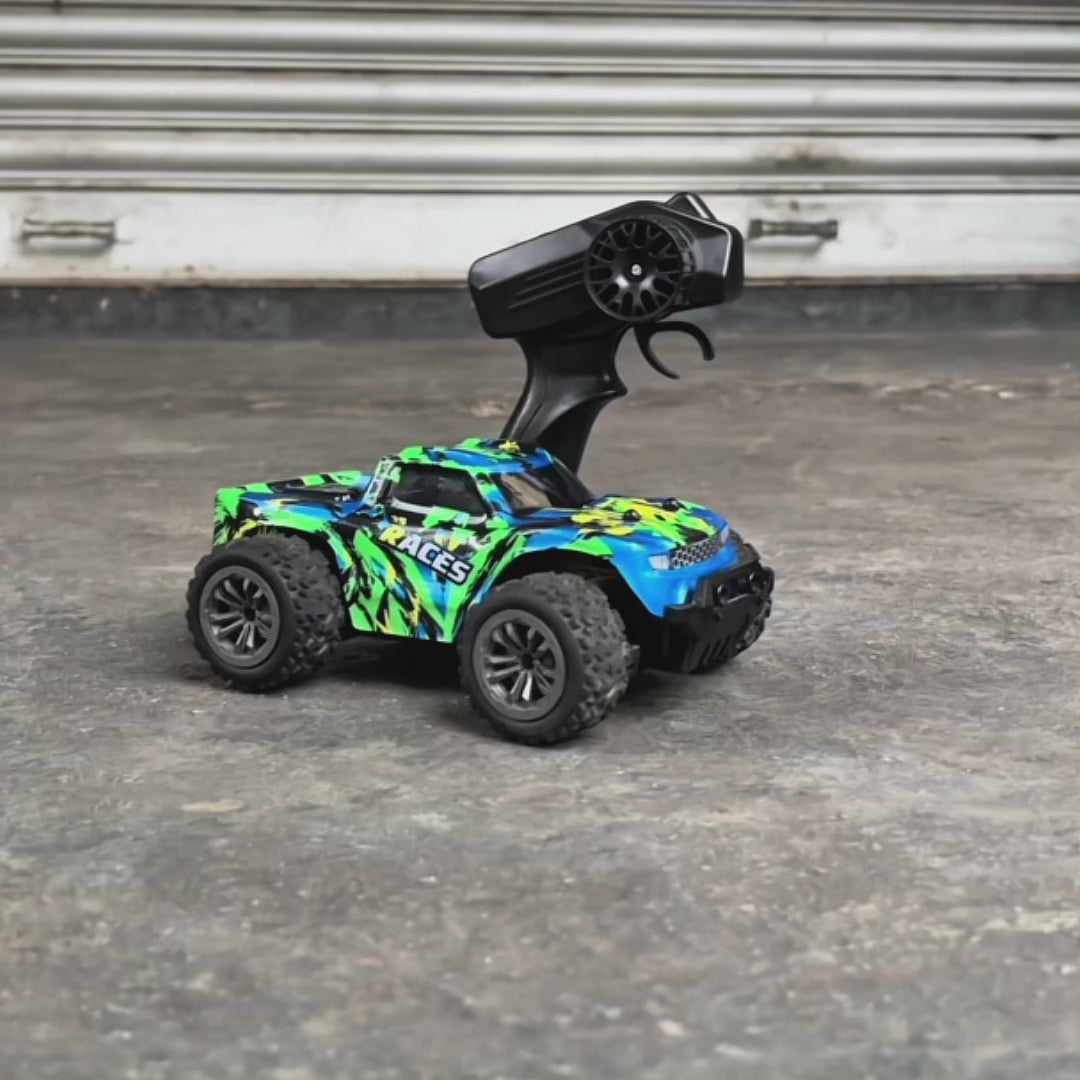 Video showcasing green RC car on a rainy day with 'L.O.T Cars' branding on it.